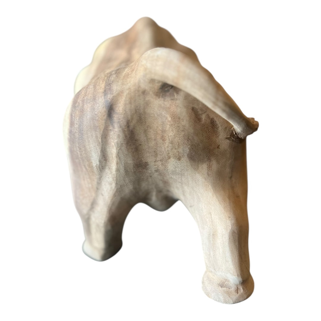 Achterkant van houten stier