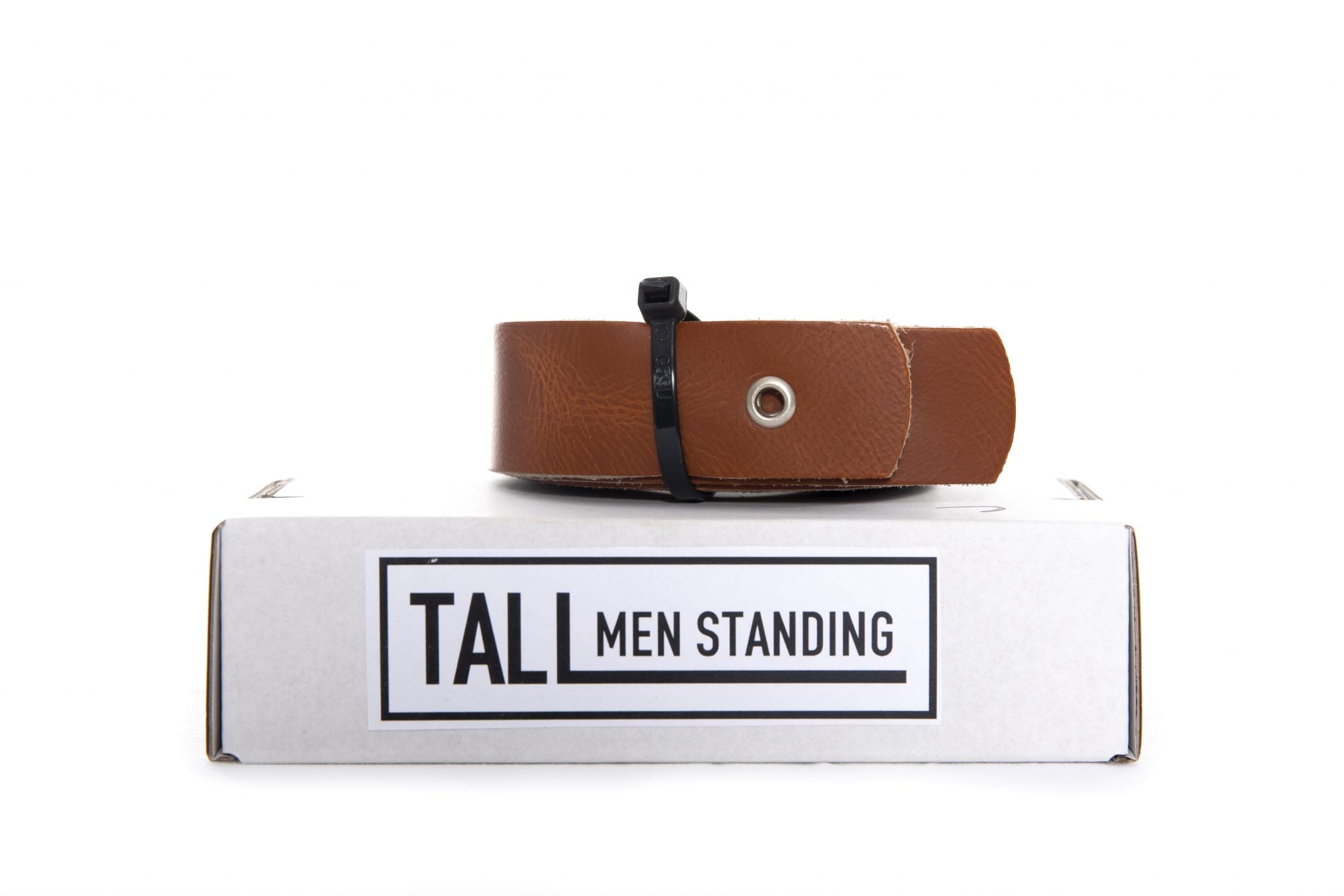 Leren plankdragers geleverd in een doos van Tall Men Standing